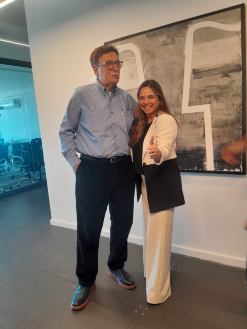 Dra. Carolina Pauliello junto al Dr. Gustavo Leibaschoff, Presidente de la WSCG